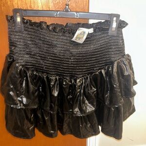 Queen of sparkles leather ruffle skirt. Built in shorts